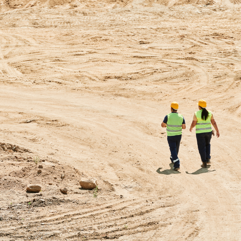 engineers walking on construction site